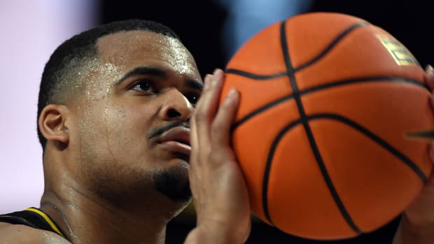 Missouri Tigers guard Nick Honor (10) shoots a free throw during the second half against the Vanderbilt Commodores at Memorial Gymnasium.